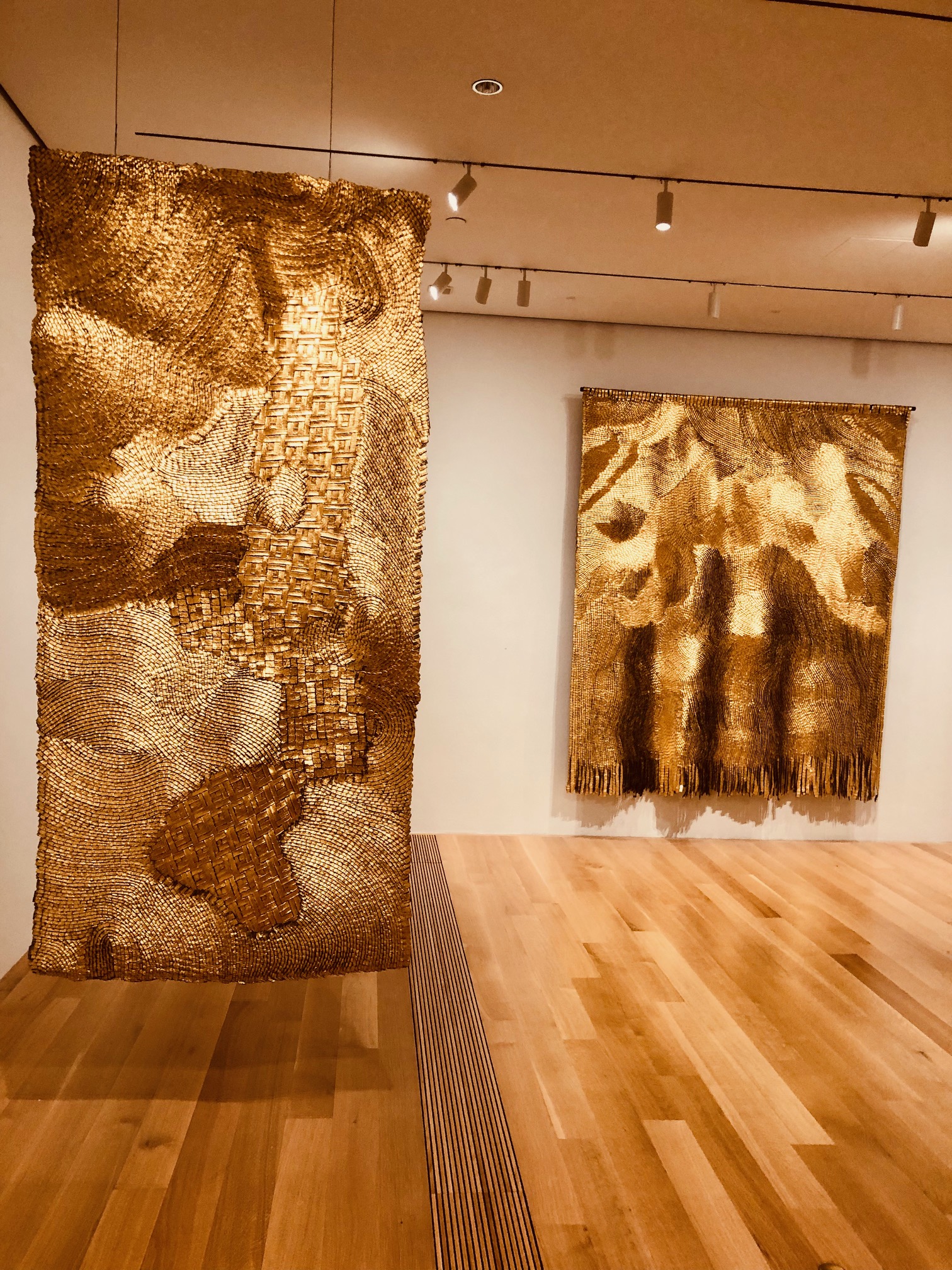 Murals of gold leaf on linen and gesso on display at the Pulitzer Arts Foundation.